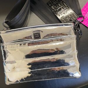 Think Rolyn metallic silver crossbody bag